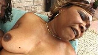 Mature ebony rides huge black cock - porn video