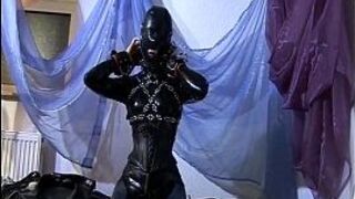 Horny girl in latex pleasuring herself - porn video